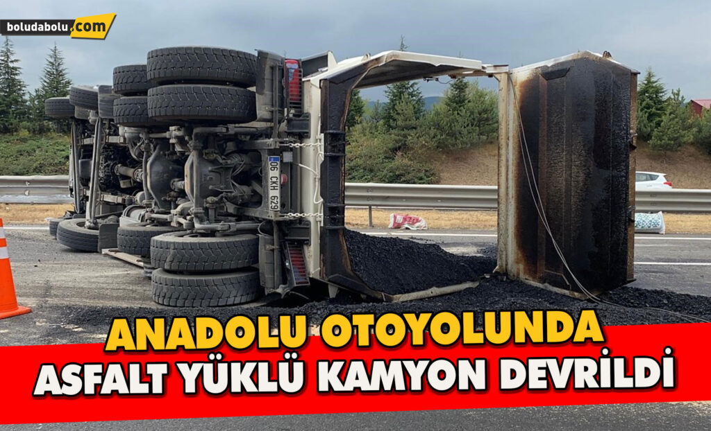 Anadolu otoyolunda asfalt yüklü kamyon devrildi Anadolu otoyolunda asfalt yüklü kamyon devrildi
